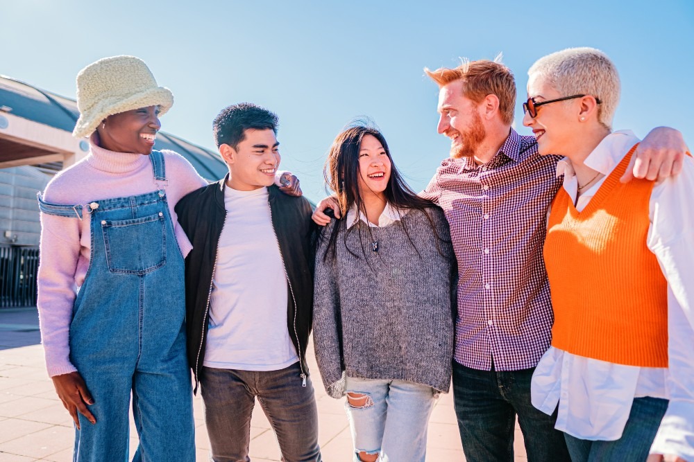 hug-in-group-of-multicultural-friends-five-young-p-2023-11-27-05-29-31-utc